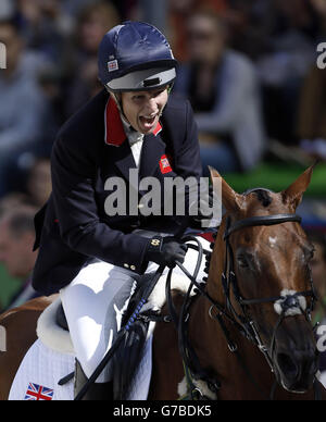 Great Britain's Zara Phillips riding High Kingdom competes in the final phase oif the Eventing competition during day eight of the Alltech FEI World Equestrian Games at Stade D'Ornano , Normandie, France. Stock Photo