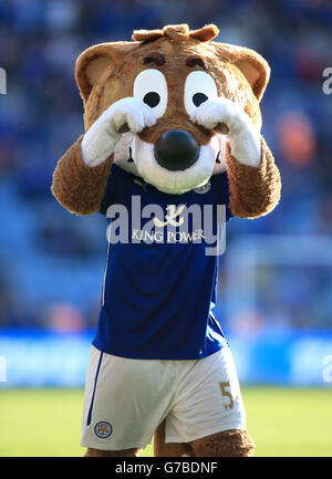 Leicester City mascot Filbert Fox taunts the Arsenal fans by rubbing his eyes after the Barclays Premier League match at the King Power Stadium, Leicester. Stock Photo