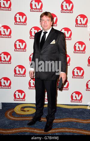 TV Choice Awards - London. Adam Woodyatt arriving for the 2014 TV Choice awards, at The London Hilton, Park Lane, London. Stock Photo