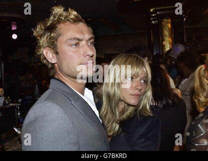 Jude Law and Sienna Miller - London Fashion Week Stock Photo