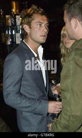 Actor Jude Law backstage at his ex-wife, fashion designer Sadie Frost's London Fashion Week Spring/Summer 2005 show, held at Titanic, Brewer Street in central London. Stock Photo