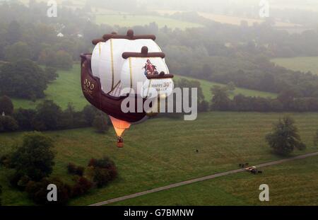 A 128ft wide hot air balloon in the shape of a galleon, which has been commissioned by Captain Morgan, flies close to Highgrove House near Tetbury in Gloucestershire, to celebrate Prince Harry's 30th birthday. Stock Photo