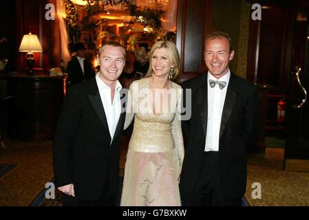 Newcastle United football star Alan Shearer (right) with singer songwriter Ronan Keating and his wife Yvonne at the Irish Society for the Prevention of Cruelty to Children (ISPCC) crown ball in the Berkley Court Hotel, Dublin. The Princess Royal was guest of honour at the crown ball to raise thousands of pounds for needy children across Ireland and joined celebrities from the world of entertainment and sport at the gala event. Stock Photo