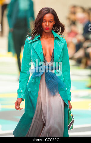A model on the catwalk for the Burberry Prorsum womenswear catwalk show at the Albert Memorial, London, during London Fashion Week. Stock Photo