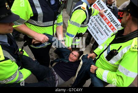 Animal rights demonstrator Vivienne Kelly is moved by members of the ...