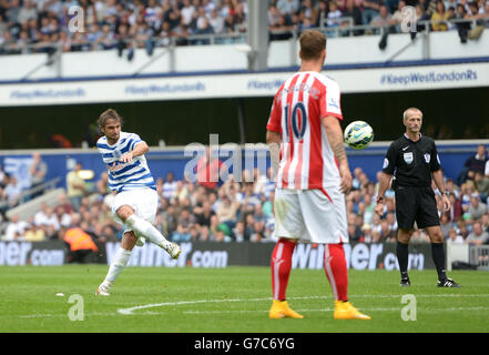 Queens Park Rangers' Niko Kranjcar scores his teams second goal of the game during the Barclays Premier League match at Loftus Road, London. Stock Photo