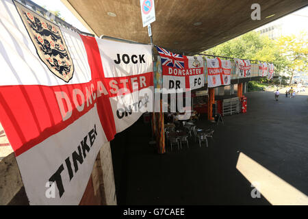 England fans hang their flags in Basel. PRESS ASSOCIATION Photo. Picture date: Monday September 8, 2014. See PA story SOCCER England. Photo credit should read: Mike Egerton/PA Wire. Use subject to FA restrictions. . Commercial use only with prior written consent of the FA. during a training session at the St Jakob-Park Stadium, Basel. PRESS ASSOCIATION Photo. Picture date: Sunday September 7, 2014. See PA story SOCCER England. Photo credit should read: Mike Egerton/PA Wire. Use subject to FA restrictions. . Commercial use only with prior written consent of the FA. Stock Photo