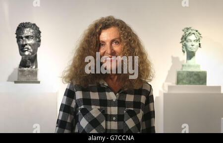 Nicole Farhi with some of her sculptures at the launch of From the Neck Up a debut exhibition of her sculptures, at Bowman Sculpture in London. Stock Photo