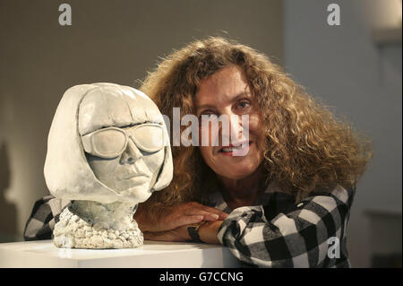 Nicole Farhi with a sculpture of Anna Wintour at the launch of From the Neck Up a debut exhibition of her sculptures, at Bowman Sculpture in London. Stock Photo