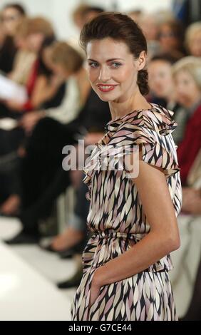 A model during the London Fashion Week Spring/Summer 2005 catwalk show by Jean Muir at the Jean Muir shop in London's Conduit Street. Stock Photo