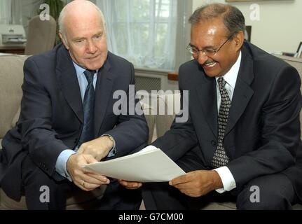 Health Secretary Dr John Reid (left) with new NHS Equality and Human Rights Director Surinder Sharma at the Department of Health in London. Stock Photo