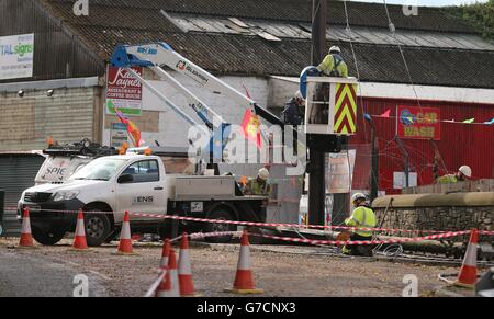 Northern Ireland Electricity repair crews work to restore power supplies in Saintfield, County Down as around 1,200 electricity customers remain without power in Northern Ireland after the region was battered by overnight storms. Stock Photo