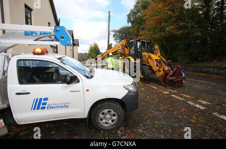 Northern Ireland Electricity repair crews work to restore power supplies in Saintfield, County Down as around 1,200 electricity customers remain without power in Northern Ireland after the region was battered by overnight storms. Stock Photo