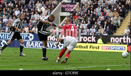 Newcastle's Alan Shearer scores against West Brom during the Barclaycard Premiership match at St James' Park, Newcastle, Saturday September 25, 2004. Stock Photo