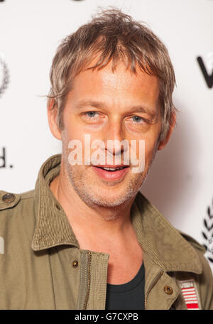 Andy Bell of Beady Eye arriving at the Raindance Film Festival Opening Gala, at the Vue Cinema, in Leicester Square, central London. Stock Photo