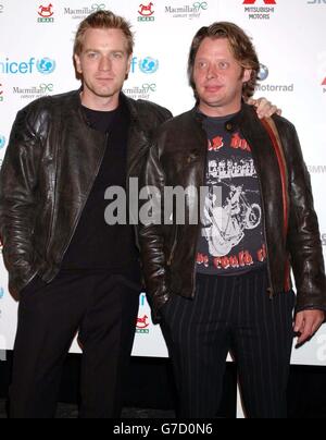 Actors Ewan McGregor (left) and Charley Boorman arrive for the Long Way Round fundraising party in aid of UNICEF, CHAS and Macmillian Cancer Relief, to celebrate the successful completion of their transcontinental motorbike expedition held at The Bridge in Bermondsey, south east London. Stock Photo