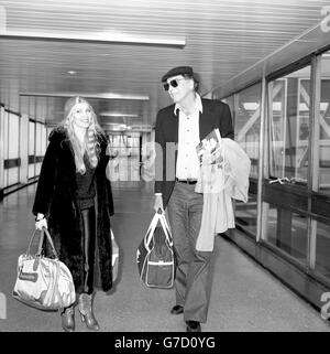 Singer-songwriter Lynsey de Paul with American actor Burt Lancaster at Heathrow Airport. They were on the same flight from Los Angeles. Stock Photo