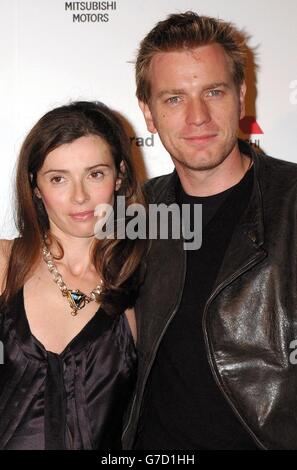 Ewan McGregor and his wife Eve arrive for the Long Way Round fundraising party in aid of UNICEF, CHAS and Macmillian Cancer Relief, to celebrate the successful completion of their transcontinental motorbike expedition held at The Bridge in Bermondsey, south east London. Stock Photo
