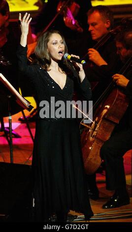 Singer Dina Carroll accompanied by the BBC Concert Orchestra, performs on stage during the BBC Children in Need 25th Anniversary Gala Concert at the Royal Festival Hall on London's South Bank. Stock Photo
