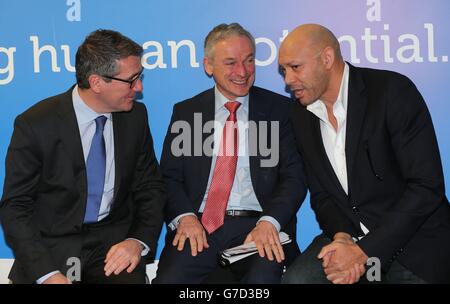 (from left) Dell Vice President for Europe, the Middle East and Africa Aongus Hegarty, Irish jobs minister Richard Bruton and Dells chief information officer Paul Walsh at the Cherrywood base of Dell in Dublin as the computer giant has announced that up to 50 new jobs are being created as it establishes a new research and development centre in Ireland. Stock Photo