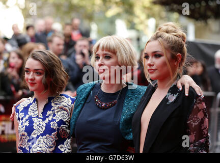 (left to right) Maisie Williams, director of the film Carol Morley and Florence Pugh arriving for the BFI London Film Festival screening of The Falling, at Odeon West End in Leicester Square, London. PRESS ASSOCIATION Photo. Picture date: Saturday October 11, 2014. Photo credit should read: Yui Mok/PA Wire Stock Photo