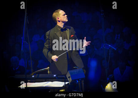 The Royal Liverpool Philharmonic Orchestra, conducted by Timothy Henty, performing at Classic FM Live, at the Royal Albert Hall in London. Stock Photo