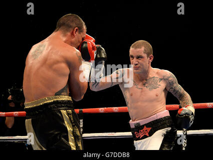 Ricky Burns (right) in action against Alexandre Lepelley in the Light Welterweight contest at the First Direct Arena, Leeds. Stock Photo