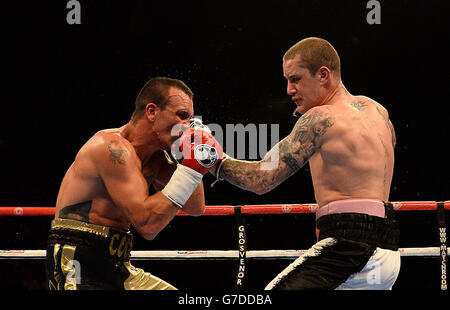 Ricky Burns (right) in action against Alexandre Lepelley in the Light Welterweight contest at the First Direct Arena, Leeds. Stock Photo