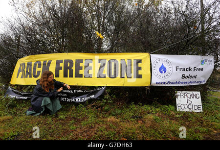 Anti fracking and fossil fuels campaigner Isabelle Bish outside a protection camp near the Horse Hill Developments site in Horley, Surrey, following a public meeting to discuss the exploratory drilling project. Stock Photo