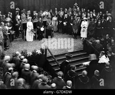 1919: The King, Queen and Queen Alexandra listen to the Lord Mayors address, at the Guidhall, London. Stock Photo