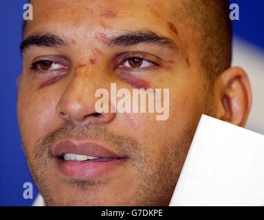 Stan Collymore signs copies of his book at WH Smith in The Trafford Centre, Manchester. The former footballer claimed that Zara Phillips tried to warn him away from a nightclub confrontation with a group of Bath rugby players in the Lillies Bordello club in Dublin, Sunday. Stock Photo