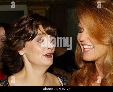 British Prime Minister Tony Blair's wife Cherie, left, jokes with the Duchess of York, before the start of a fund raising ball, for the Parents and Abducted Children Together charity ball in Central London. Stock Photo