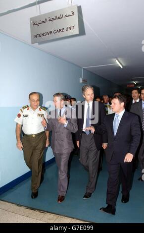 Left to right: Royal Medical Services of Jordan Surgeon General Dr Manaf Hijazi, The Prince of Wales, British Ambassador to Jordan Christopher Prentice and Jordan's King Abdullah arrive at the Intensive Care Unit of the King Hussain Medical Centre in Amman, Jordan, to visit injured passengers following a coach crash involving British and Jordanian citizens near Petra earlier today.