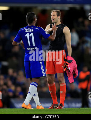 Chelsea's Didier Drogba (left) celebrates after the game with Petr Cech during the UEFA Champions League Group G match at Stamford Bridge, London. Stock Photo
