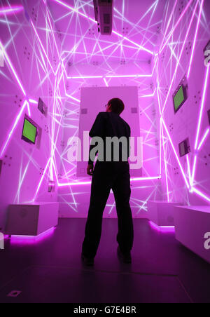 A technician checks the Web story box display at the Information Age gallery at the Science Museum in central London which is a new gallery dedicated to the history of information and communication. Stock Photo