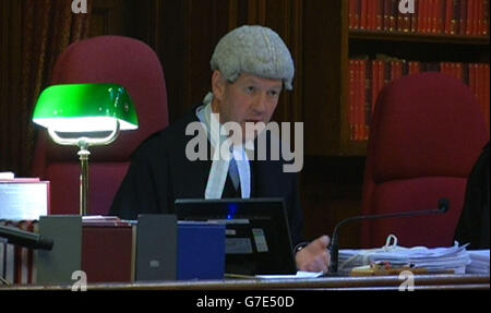 EDITORIAL USE ONLY A still taken from a video feed of Lord Justice Treacy during the filming of Max Clifford's appeal hearing in the Court of Appeal, London, as the three Court of Appeal judges said they would give their decision in his case at a later date after they heard argument on his behalf against his 'too long' prison term. Stock Photo