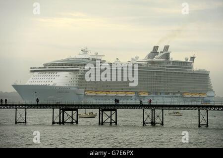 The world's largest cruise ship, MS Oasis of the Seas, owned by Royal Carribbean, makes her way up Southampton Water into Southampton where she will stay for a day before heading to the US. Stock Photo