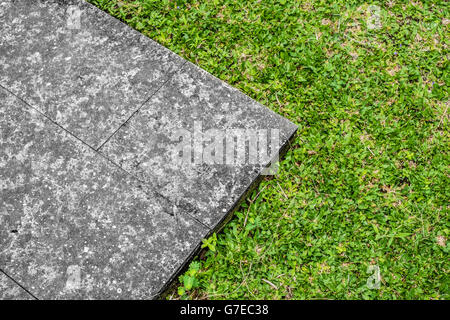 Concrete walkway with grass Stock Photo