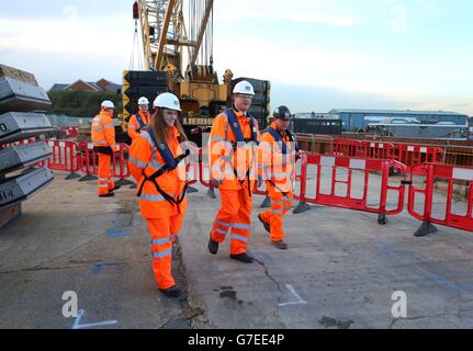 Prime Minister David Cameron (centre) with Kelly Tolhurst (left), the new Conservative candidate for Rochester and Strood, are shown around the Crossrail site in Chatham, Kent, by site manager Michael O'Neil during a visit to the constituency ahead of the upcoming by-election. Stock Photo