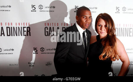 Ashley Young and partner Nicky Pike arrive at the United for UNICEF Gala Dinner attended by the Manchester United first-team and VIP guests at Old Trafford, Manchester. Stock Photo