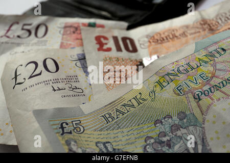 Stock picture Fifty, Twenty, Ten, and Five pound notes. Stock Photo