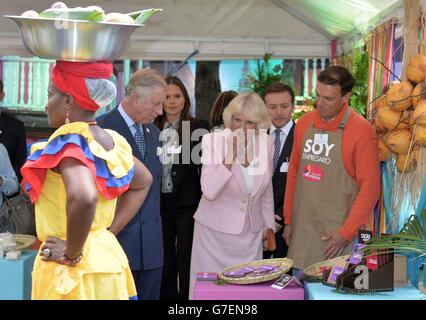 The Prince of Wales and The Duchess of Cornwall view Caribbean produce as they tour an Organic and Urban Sustainability Fair at the British Ambassador's residence in Bogota, Colombia, on the second day of the Prince of Wales and Duchess of Cornwall's tour to Colombia and Mexico. Stock Photo