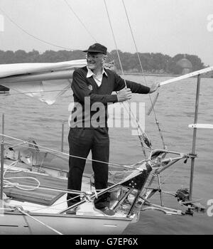 Sir Francis Chichester aboard The Gipsy Moth IV at Greenwich, London. He is to sail from Plymouth to Sydney, Australia non-stop, and return via the Horn to London. On the 17/11/2004 Gipsy Moth IV the first sailing boat to have completed a solo, one-stop circumnavigation of the globe is being transported from its London home to be renovated to its former glory. Stock Photo