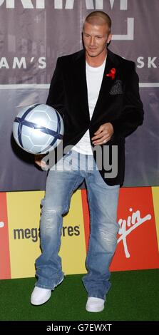 David Beckham shows off his football skills, during an in-store appearance at Virgin Megastore on Oxford Street, central London, to sign copies of his official training skills DVD, 'Really Bend It Like Beckham'. Stock Photo