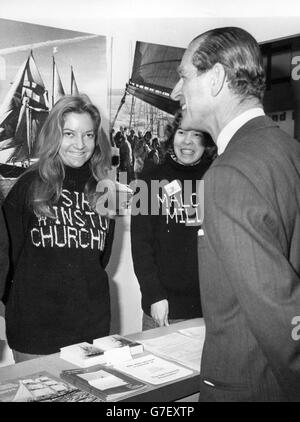 The Duke of Edinburgh chats to Tina Pedder (l) and Joy Wayman on the stand for the Sail Training Association, of which he is a patron, during his tour of the Boat Show at Earls Court, London. *Scanned low-res from print, high-res available on request* Stock Photo