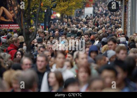 Christmas shoppers out in force on London's Oxford Street. The nightmare before Christmas officially began today, according to a mathematician who claims to have calculated the moment fun festive shopping becomes a headache. The precise time the pleasures of present buying were outweighed by the stress and irritants was 12.30pm on the so-called Black Saturday, according to university maths head Dr Tony Mann. Stock Photo