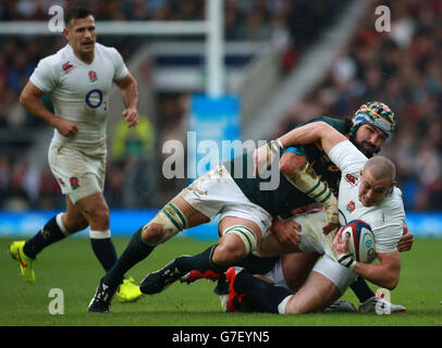 Rugby Union - QBE International 2014 - England v South Africa - Twickenham. England's Mike Brown is tackled by South Africa's Victor Matfield during the QBE International at Twickenham, London. Stock Photo