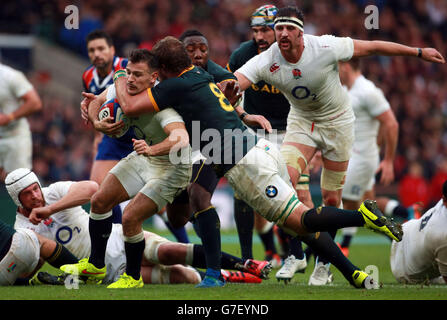 Rugby Union - QBE International 2014 - England v South Africa - Twickenham. England's Danny Care is tackled by South Africa's Duane Vermeulen during the QBE International at Twickenham, London. Stock Photo