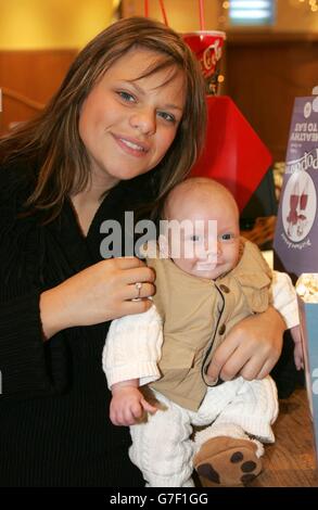 Reality TV star Jade Goody and her newborn son Freddie pose for photographers during the launch of Huggies Big Scream at Brixton Ritzy Cinema in south London. Sponsored by Huggies, Big Scream in association with Picturehouse Cinemas is a weekly showing of the latest film releases whereby mums and dads are encouraged to bring their babies into the cinema with them. Stock Photo