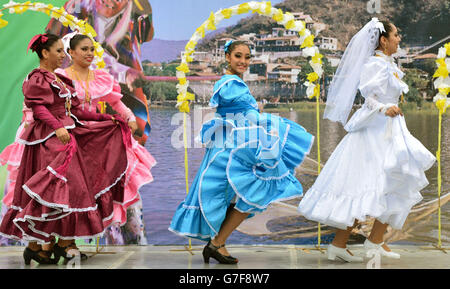 Traditional dancers perform as The Prince of Wales and The Duchess of Cornwall receive an official welcome by the Governor Rodrigo Medina and First Lady Gretta Selinas de Medina of Nuevo Leon at the Parque Fundidora, Monterrey in Mexico, on the ninth day of the Prince of Wales and Duchess of Cornwall's tour to Colombia and Mexico. Stock Photo